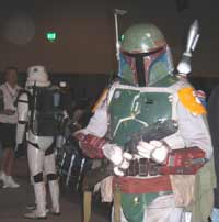 Boba Fett and a sandtrooper on the left in the background at Star Wars Spectacular at Comic-Comic 2004.