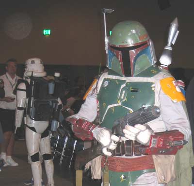 Boba Fett and a sandtrooper on the left in the background at Star Wars Spectacular at Comic-Comic 2004.